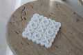 Scalloped White Noughts and Crosses